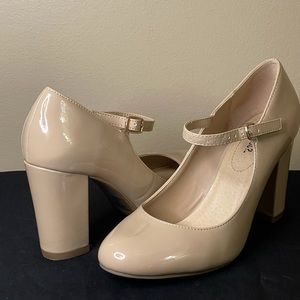 Nude Mary Janes patent leather